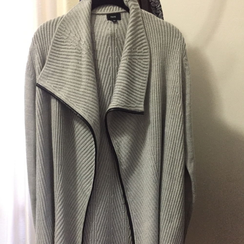 LEATHER-LINED KNIT SWEATER